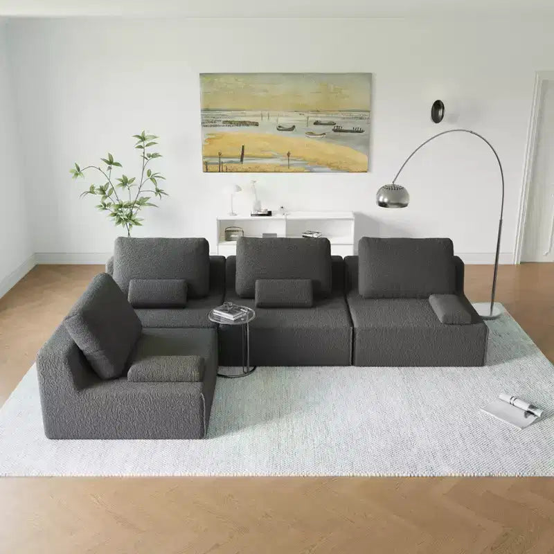 Canapé quatre places molletonné à compression modulaire moderne